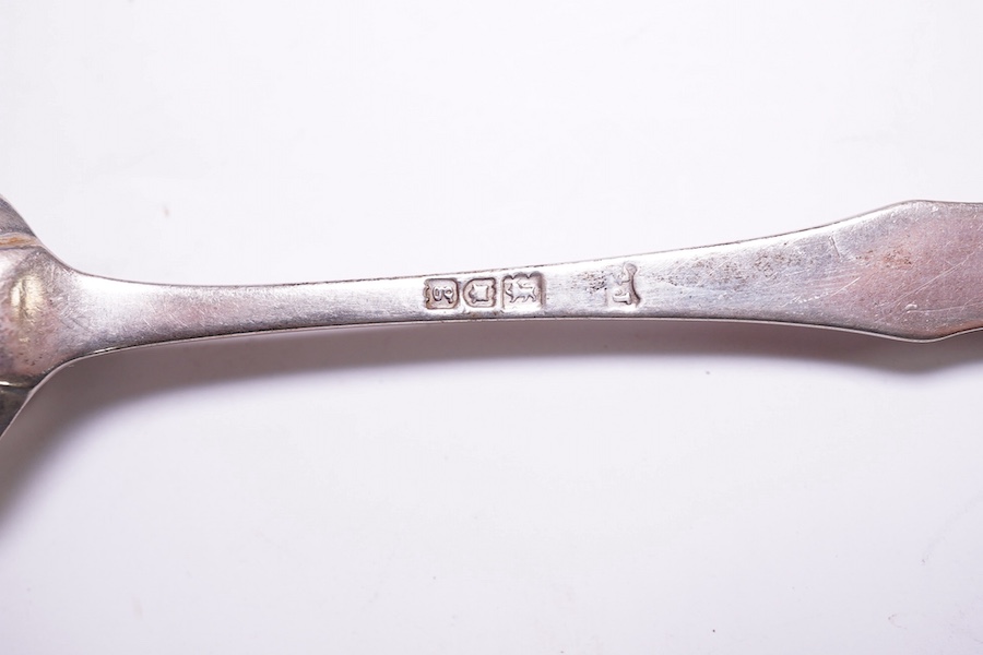 A cased Edwardian silver Christening trio, by Henry Wigful, Sheffield, 1909 and a cased set of eleven Edwardian silver coffee spoons and pair of sugar tongs, London, 1901/2 and one odd silver golf related teaspoon. Condi